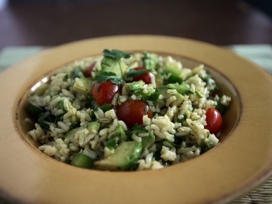 A bowl of Avocado grape tomato rice salad in the Free